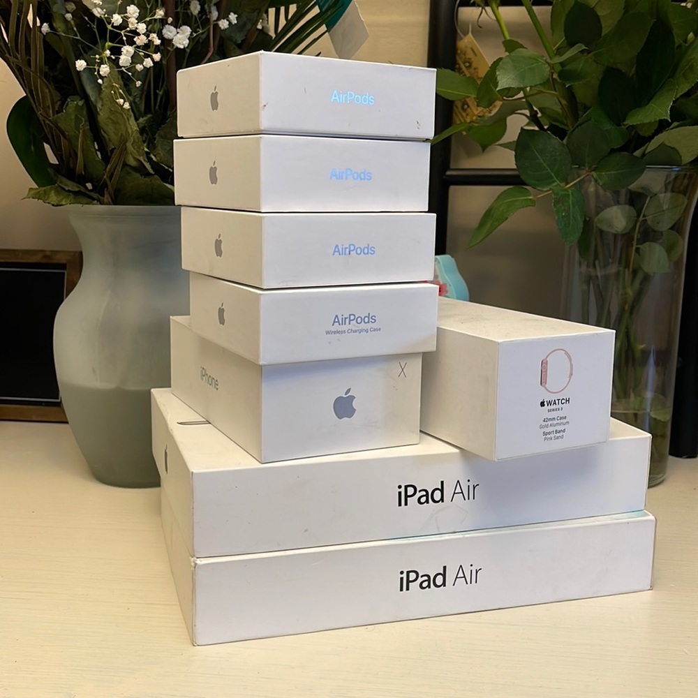 8 boxes of different size Apple products